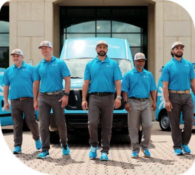 C Spire crew walking in front of service truck