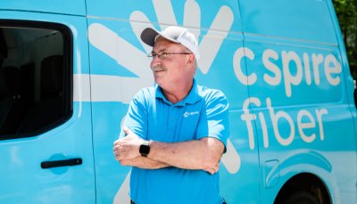 C Spire Fiber Installer in front of truck