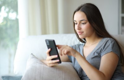 Teenage girl using mobile phone